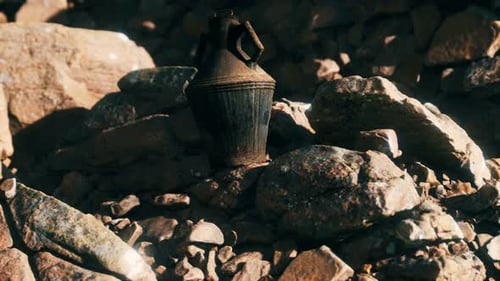 Old Metal Jug at Rocks
