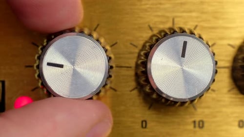 Hand Adjusting Silver and Gold Volume Control Knob