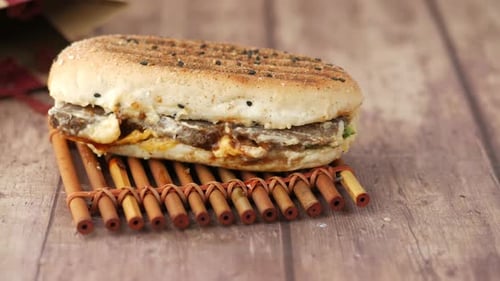 Detail Shot of Club Sandwich on Wooden Table