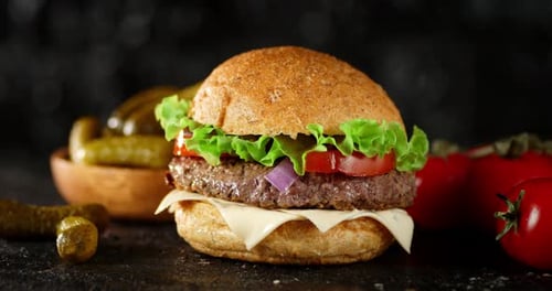 Delicious Hamburger with Fresh Ingredients on Dark Background