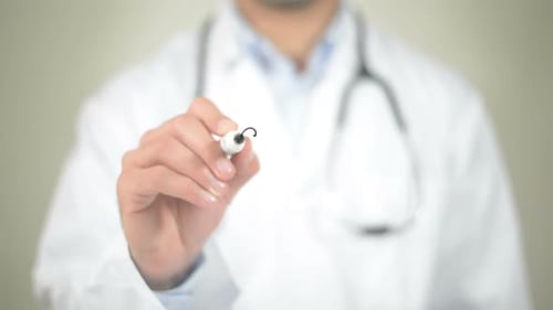 Doctor Writes "Safety" on Transparent Surface