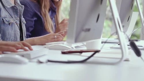 Close Up Shot of Businesswoman Hand Typing and Working on Computer on Desk