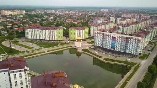 Aerial view of city residential area with high apartment buildings.