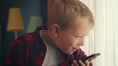 Young Boy Talking on the Phone