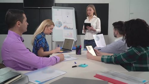 Business Presentation at Office Meeting With Colleagues
