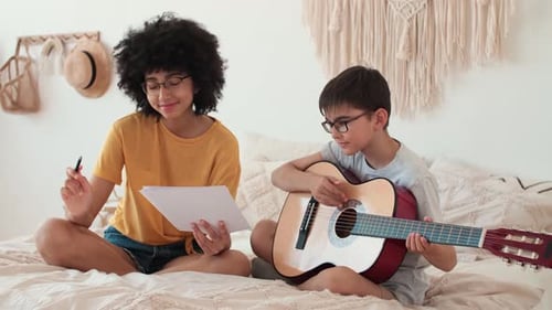 Children Play Music Together at Home