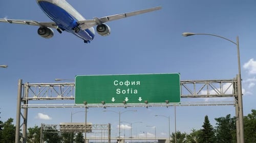 Airplane Flying Over Sofia City Highway Sign
