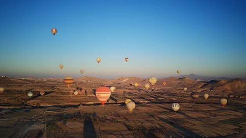 Hot Air Balloons Soaring in Cappadocia at Sunrise