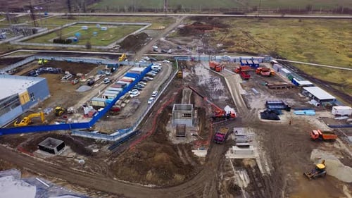 Truck Crane Operates with Blocks at Construction Site