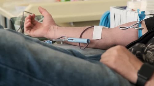 Man Lies in Center of Blood and Donates Blood