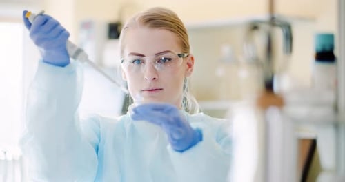 Woman Scientist Working in Modern Laboratory