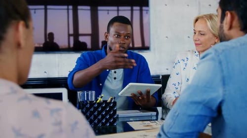 Executives having discussion in the meeting at office