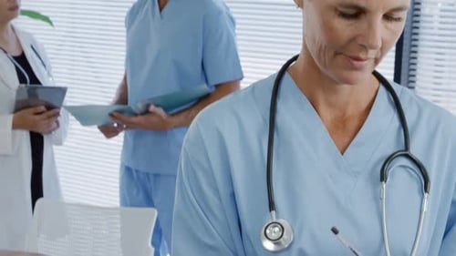 Medical Staff Collaborating in Modern Hospital Setting