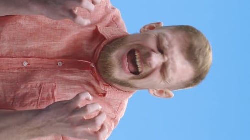 Young Man Taunting at Camera