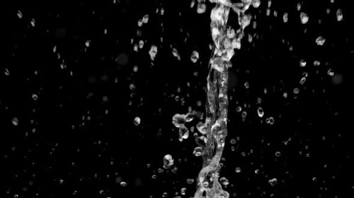Water Droplets and Streams on Black Background
