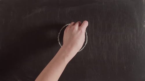 Gender Symbols and Equality Drawn on Chalkboard