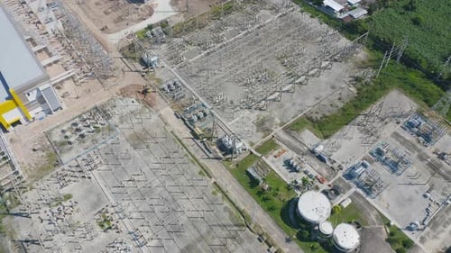 Aerial view of electricity generating, voltage poles. Power lines on utility tower and cable wires