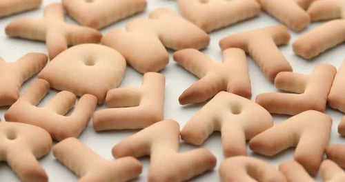 Delicious Letter Cookies Displayed Close Up on Surface