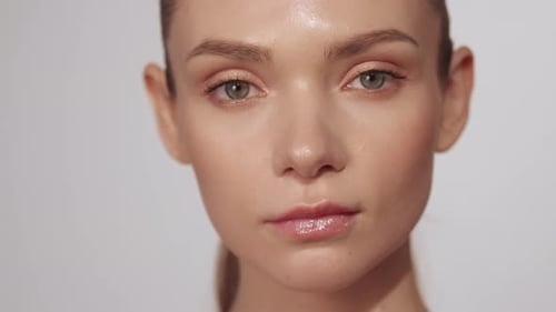 Young Woman's Beauty in a Close Up Portrait