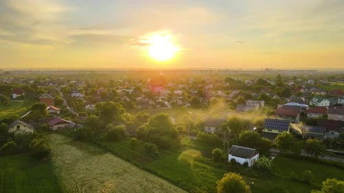 Aerial View of Residential Houses in Suburban Rural Area at Sunset