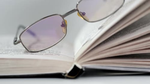 Closeup of Open Book on the Floor Selective Focus and Shallow Depth of Field