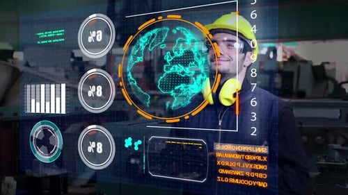 Un ouvrier d'usine utilise un futur dispositif d'écran holographique pour contrôler la fabrication