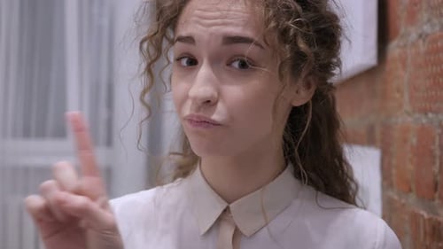 Young Adult Woman Shaking Head No