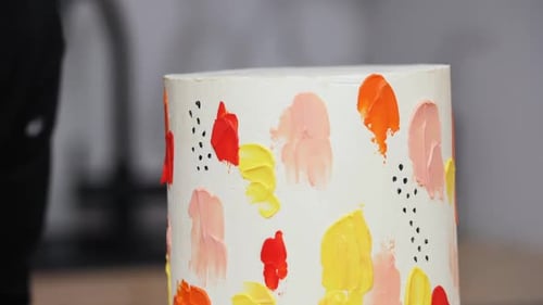 The Pastry Chef Paints a White Cream Cake