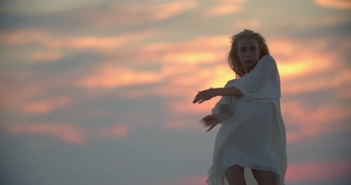 Footage of a Young Woman Dancing on the Pier of a Lake Pretty Lady