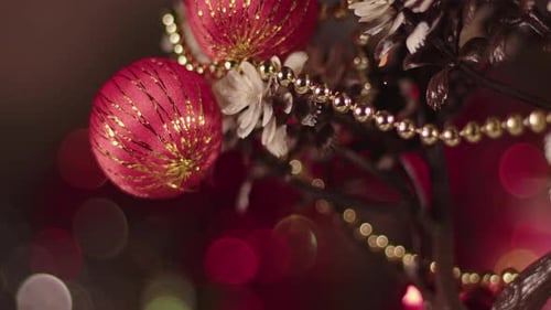 Elegant Christmas Tree with Red Ornaments and Beads