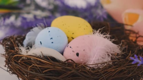 Pastel Easter Eggs in a Woven Nest
