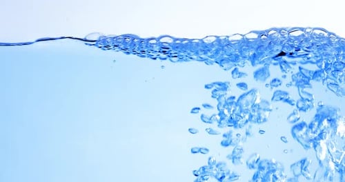 Many Bubbles in Water Close Up Abstract Water Wave with Bubbles in Slow Motion