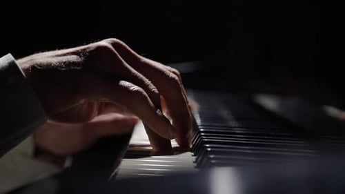 Piano Player's Hands Elegantly Performing Close Up