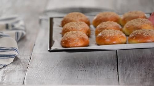Freshly Baked Yeast Buns with Crumble on Baking Sheet. Sweet Bread