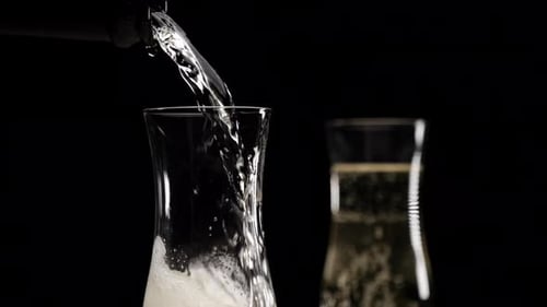 Pouring Champagne into a Glass, Close Up