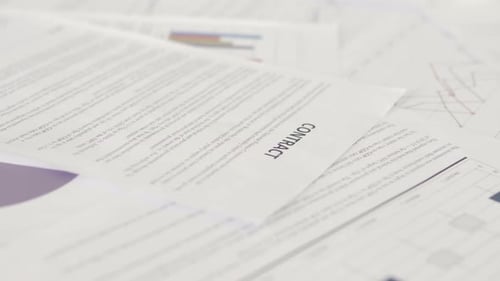 Documents and Contracts on the Workplace Table