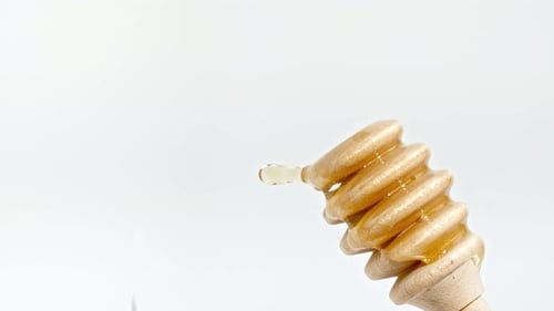 Honey Dripping to a Honey Dipper