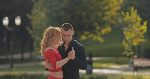Professional Dancers Rehearsing on a City Street