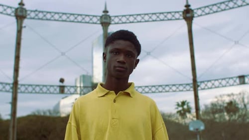Young Adult Poses in an Urban Park Setting