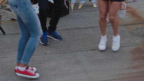 Friends Dancing at a Rooftop Party