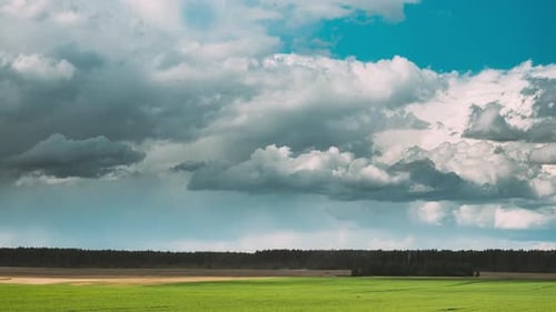 Sky With Clouds On Horizon Above Rural Landscape Meadow Time Lapse