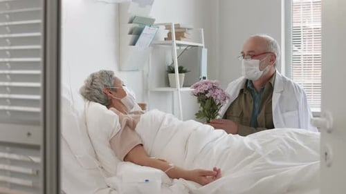 Old Man Coming to Visit Wife in Hospital