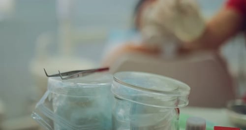 Dentist Using Tools in Hospital Environment