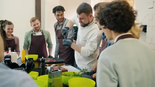 Adults Learn Cooking in a Cooking Class