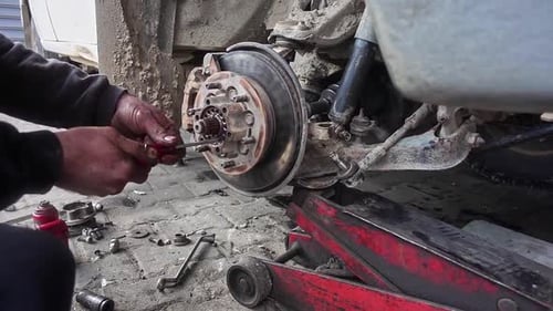 Brake Parts Of The Car Are Changing In The Repair Shop
