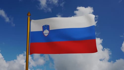 Realistic Waving Flag of Slovenia Against Blue Sky