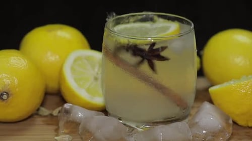 Lemon Slice Dropped Into Glass of Lemonade
