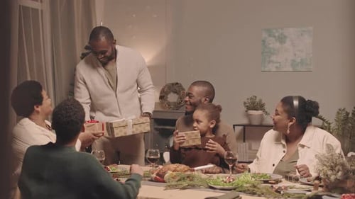 Family Celebrates Christmas Together at Holiday Dinner