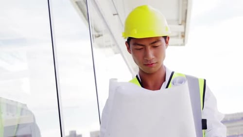 Architect reading plan