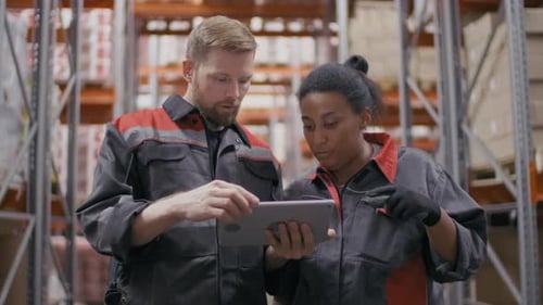 Multi-Ethnic Working People At Warehouse